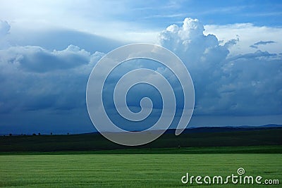 Cloudy field fields in the spring Stock Photo