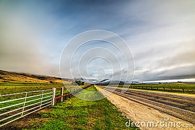 Cloudy sky over Pacific Coast Highway Stock Photo