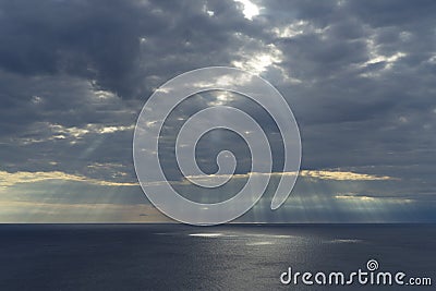 Cloudy sky and sun rays on Adriatic Sea in Croatia Stock Photo