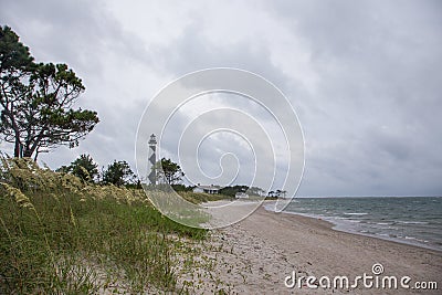 Cloudy Stormy Skies over Cape Lookout Light house Stock Photo