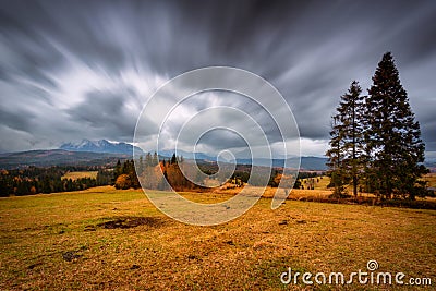 A cloudy sunrise over the autumnal Tatra Mountains. The pass over Lapszanka in Poland Stock Photo