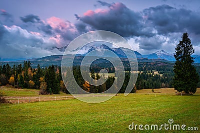 A cloudy sunrise over the autumnal Tatra Mountains. The pass over Lapszanka in Poland Stock Photo