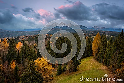 A cloudy sunrise over the autumnal Tatra Mountains. The pass over Lapszanka in Poland Stock Photo