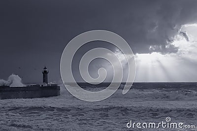 Cloudy sunset with sunbeams in the Oporto coast Stock Photo