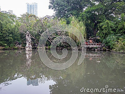 Cloudy view of the Lou Lim Ioc Garden Stock Photo