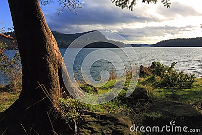 Galiano Island, Montague Harbour Marine Provincial Park, Cloudy Winter Sunset over Trincomali Channel, British Columbia, Canada Stock Photo