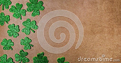 Clover background pattern on brown background Stock Photo