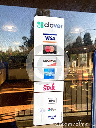 Clover Network, MasterCard, VISA, American Express, Discover, Star, Apple Pay, Google Pay, Samsung Pay contactless payment options Editorial Stock Photo
