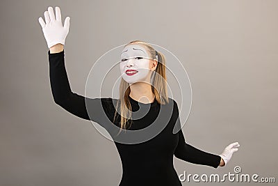 Clown in the form of pantomime, welcome hand gesture. Stock Photo