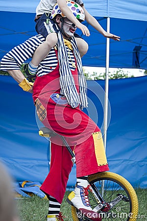 Clown during outdoor performance on Kids Day Editorial Stock Photo