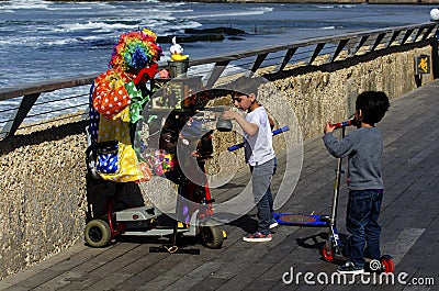 Clown playing in Tel-Aviv harbor Editorial Stock Photo