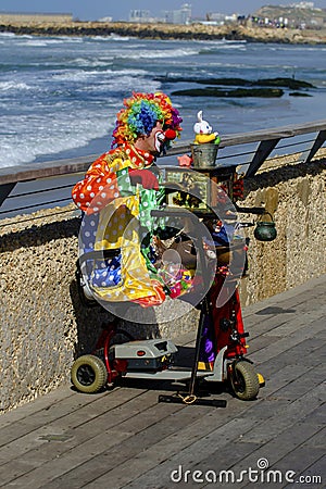 Clown playing in Tel-Aviv harbor Editorial Stock Photo