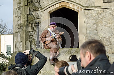 Clown with ukelele Editorial Stock Photo