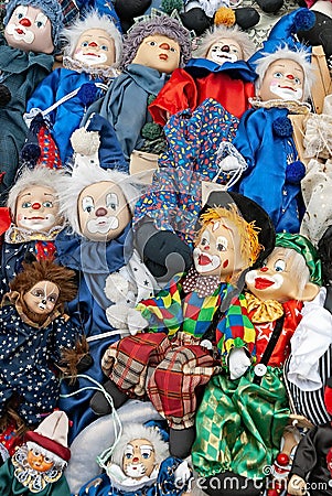 Clowns pile at flea market Stock Photo