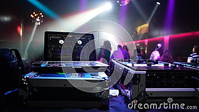 DJ Playing music in a night club Editorial Stock Photo