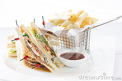 Club Sandwich Cheese, Cucmber, Tomato , Lettuce and french Fries Stock Photo