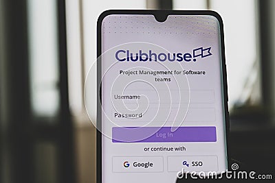 Clubhouse application view on the smartphone display Editorial Stock Photo