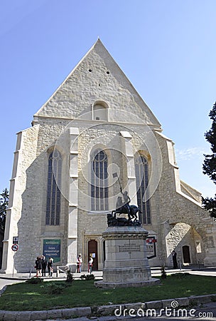 Cluj-Napoca RO, September 23th: St George Statue front of Reformed Church in Cluj-Napoca from Transylvania region in Romania Editorial Stock Photo