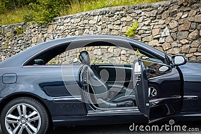 Sport german car - coupe - black metallic paint photo session in Editorial Stock Photo