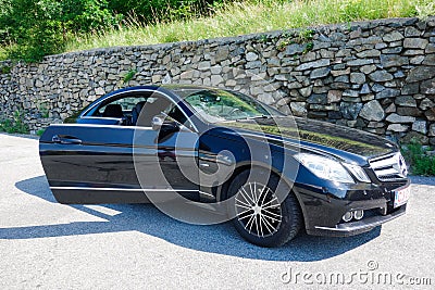 Cluj Napoca/Romania - June 20, 2018: Mercedes Benz E Class Coupe, model W207 - year 2010, Avantgarde equipment, AMG Alloy wheels, Editorial Stock Photo