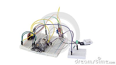 CLUJ-NAPOCA, ROMANIA - MAR 12, 2020: Embedded microelectronics components on prototyping board Stock Photo