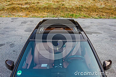 German luxurious sedan car - xxl sunroof, red/brown leather interior, chromed ornaments, expensive custom made individual car Editorial Stock Photo