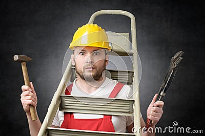 Clumsy worker with tools Stock Photo