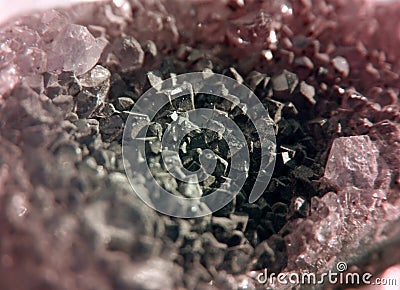 Cluster geode filled with rock Quartz crystals. Stock Photo