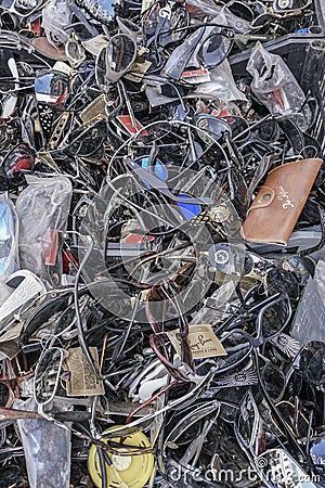 Cluster, pile of old sun glasses that are new and some used second hand Editorial Stock Photo