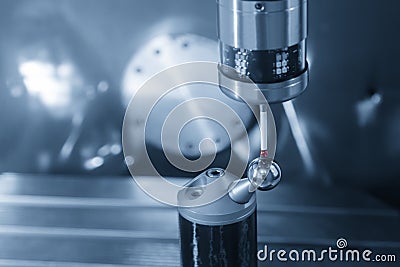 The CMM probe attach with the CNC machine spindle Stock Photo