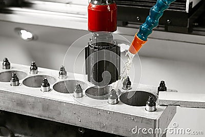 CNC Automatic Cylinder Honing Machine of engine. Car workshop, machine with a Computer numerical control. Stock Photo