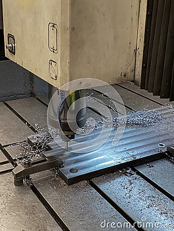 CNC 3 axis machine are working process on metal factory Stock Photo