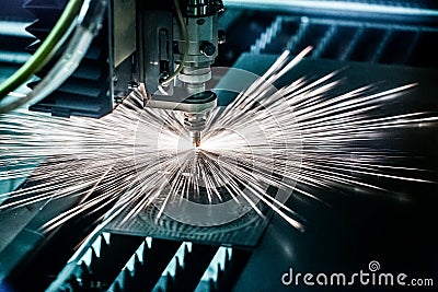 CNC Laser cutting of metal, modern industrial technology. Stock Photo