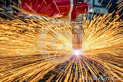 CNC Laser cutting of metal, modern industrial technology. Stock Photo