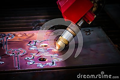 CNC Laser plasma cutting of metal, modern industrial technology. Stock Photo