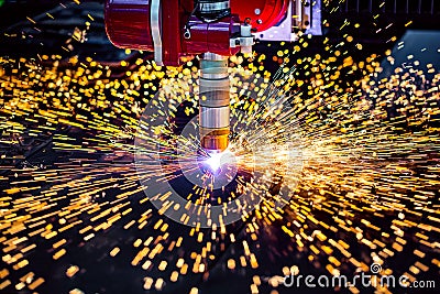 CNC Laser plasma cutting of metal, modern industrial technology. Stock Photo