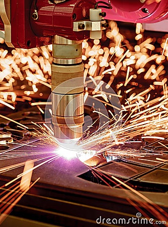 CNC Laser plasma cutting of metal, modern industrial technology. Stock Photo