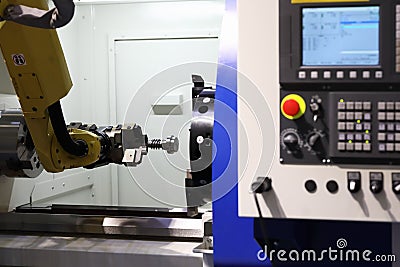 CNC machining center with collaborative robot Stock Photo