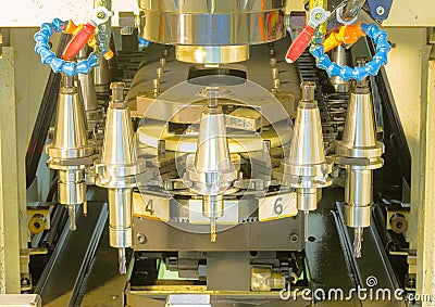 CNC machining center tool change magazine close up Stock Photo