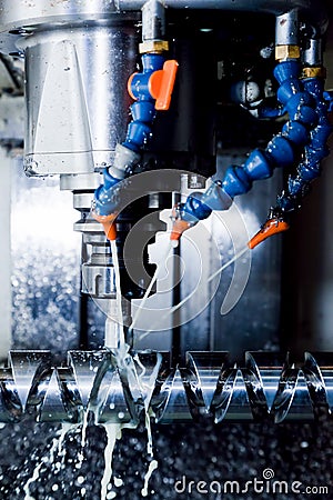 CNC machining station at work. Milling, threading industry. Stock Photo