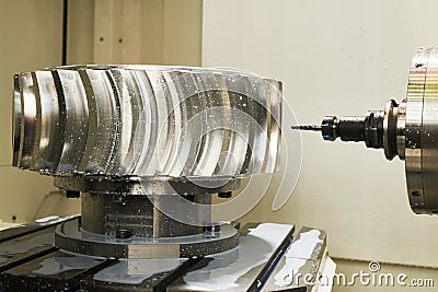 CNC milling machine work. cogwheel metalwork industry Stock Photo