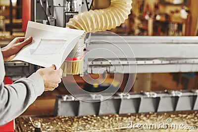 CNC router machine creates a layout of the shelf complex. Stock Photo