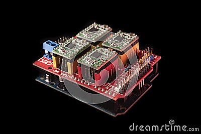 CNC shield. Arduino UNO board on black background, close up. Microcontroller for programming and prototyping Stock Photo