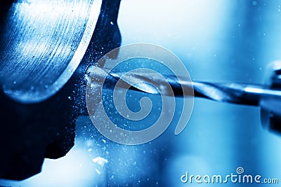 CNC turning, drilling and boring machine at work close-up Stock Photo