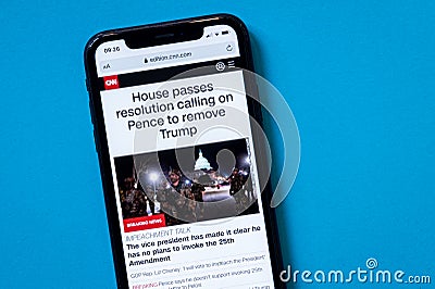 CNN.com homepage on a smartphone with a breaking news Editorial Stock Photo