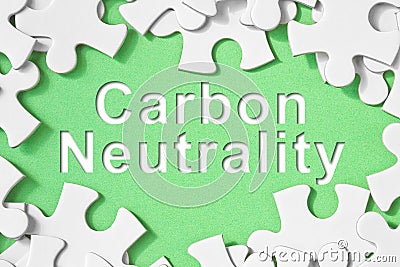 CO2 Net-Zero Emission - Carbon Neutrality concept in jigsaw puzzle shape Stock Photo