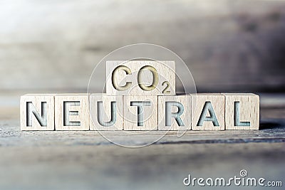 CO2 Neutral Written On Wooden Blocks On A Board -Reduce Global Warming Concept Stock Photo