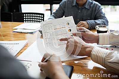 Co-workers are consultants on business documents, tax Stock Photo