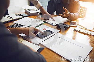 Co-workers are consultants on business documents, tax Stock Photo