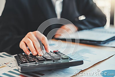 Co-working Business Team Accounting investment and saving cost discussing new plan financial graph data Stock Photo
